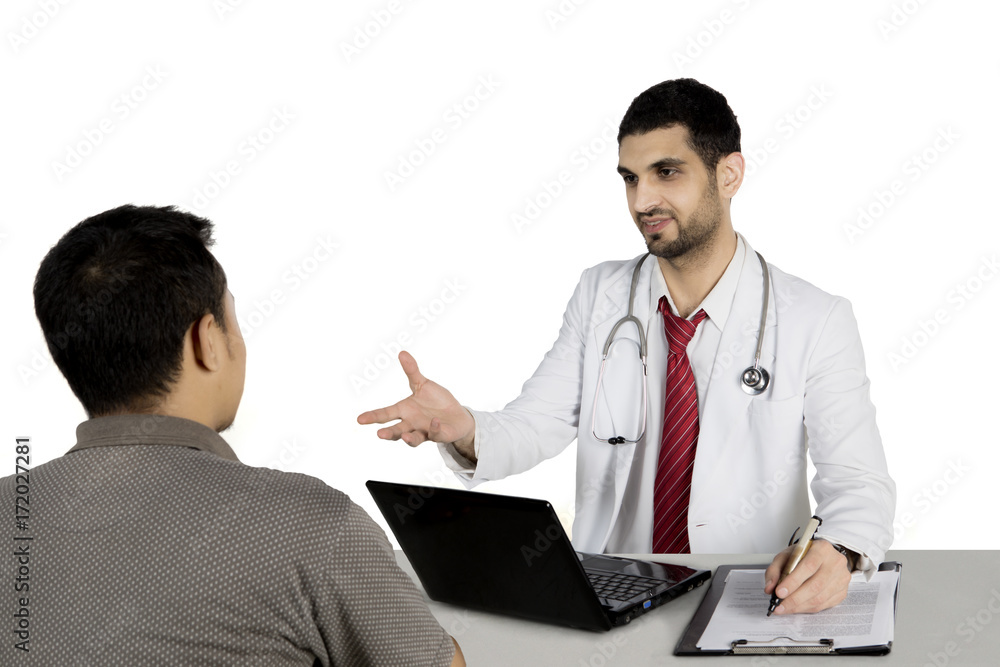 Italian doctor discussing with his patient on studio Italian doctor discussing with his patient on studio