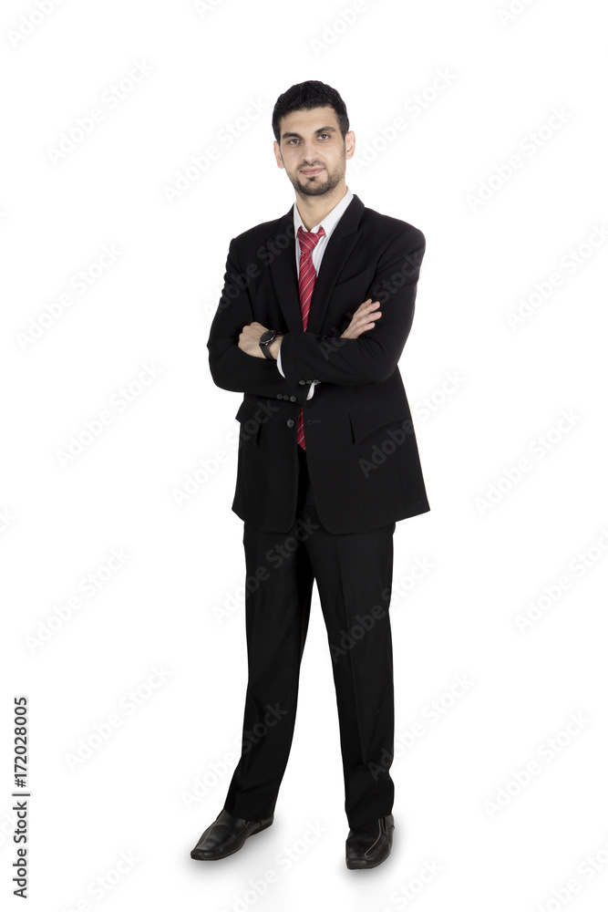 Confident Arabian businessman standing in the studio Confident Arabian businessman standing in the studio
