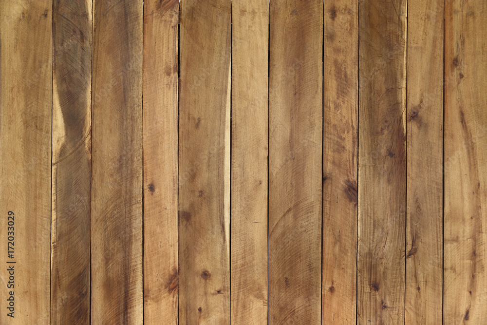 Wood Panel Background, natural brown color, stack vertical to show grain texture Wood Panel Background, natural brown color, stack vertical to show grain texture