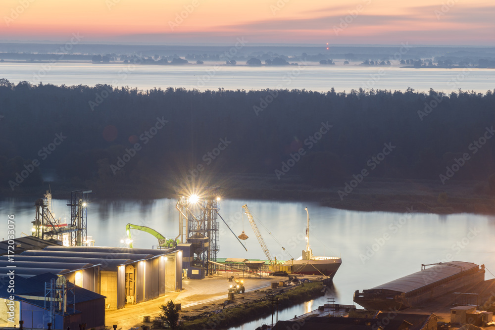 commercial port in the morning, unloading of the ship commercial port in the morning, unloading of the ship