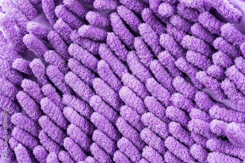 Close Up Violet Microfiber Cleaner Glove, on white background © yingtanthawarak