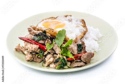 Close up Rice topped with stir fried minced pork and basil