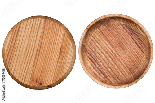 Round cutting board and a plate of wood, isolated on white background, closeup, top view