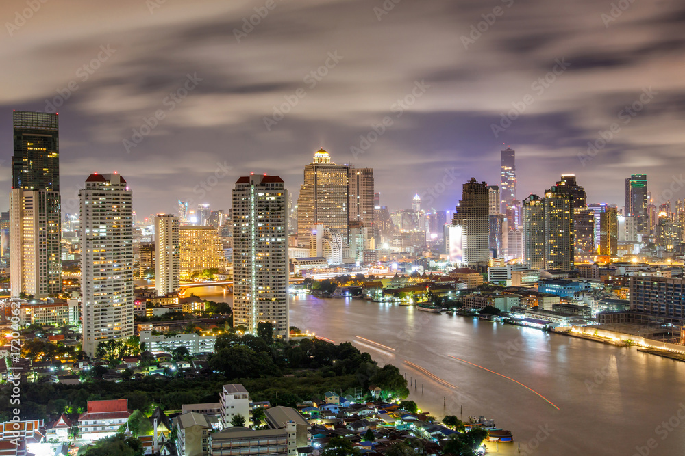 Fototapeta premium Aerial view of Bangkok modern office buildings, Condominium in Bangkok city downtown with night scene, Bangkok, Thailand