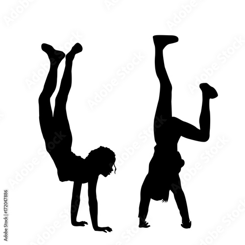 Kids standing upside down on their hands