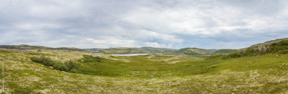 View of the mountain tundra near the coast of the Barents Sea View of the mountain tundra near the coast of the Barents Sea