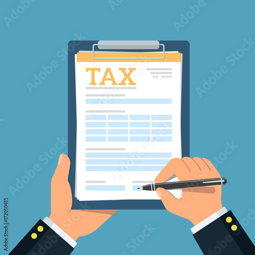Close-up of person hands with tax clipboard and pen. Business concept of filling tax form.