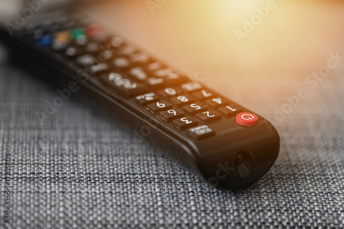 TV remote control on couch photo