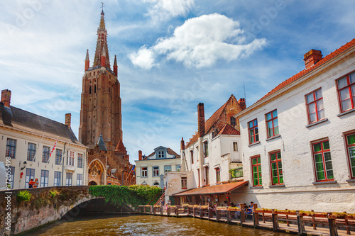 Canals of Bruges (Brugge). Church of Our Lady, Onze Lieve Vrouw Brugge photo