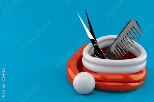 Obraz na płótnie Barber scissors with comber inside santa hat