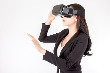 Young woman enjoy with virtual reality glasses on white background