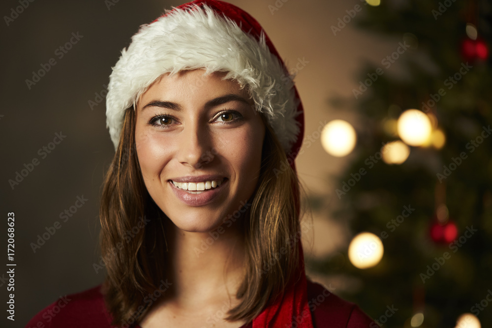 Brown eyed Christmas beauty smiling to camera Brown eyed Christmas beauty smiling to camera