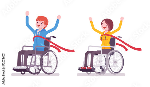 Male and female young wheelchair user crossing red finish line