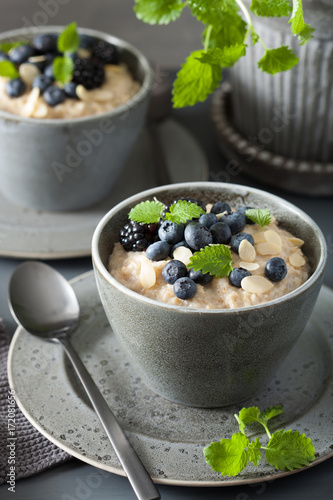 healthy breakfast steel cut oatmeal porridge with blueberry blackberry