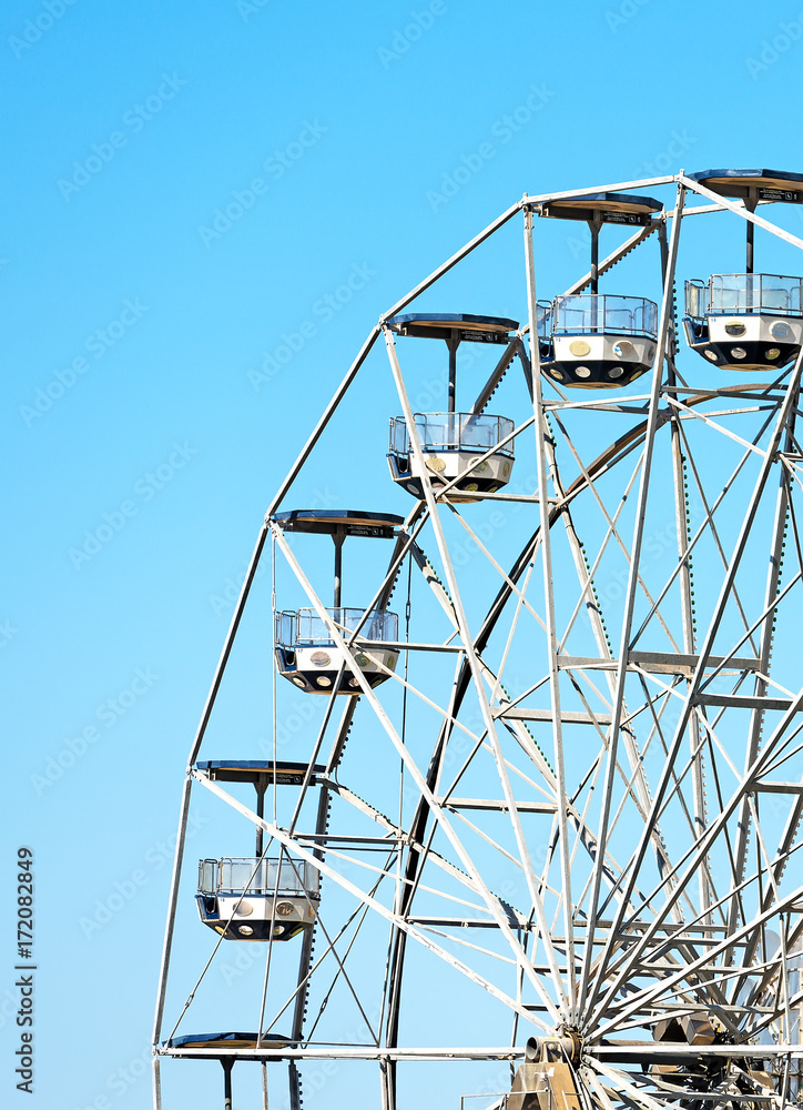 Ferris wheel in the city park. Ferris wheel in the city park.