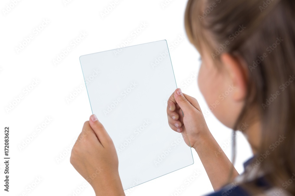 Close-up of girl using glass digital tablet Close-up of girl using glass digital tablet