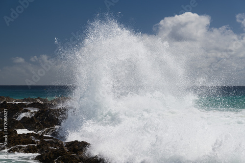waves crashing over Snapper Rocks