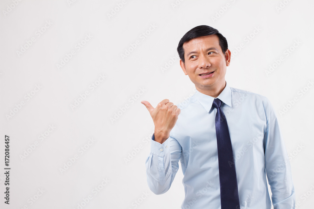 businessman pointing up thumb up to his side businessman pointing up thumb up to his side