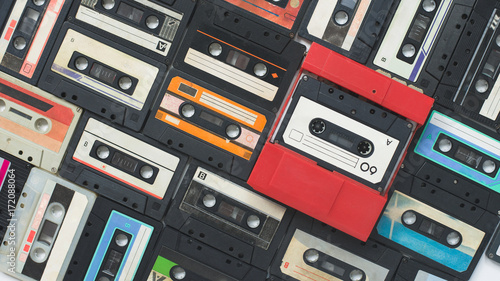 Colored background of old vintage cassettes of the 60-80s