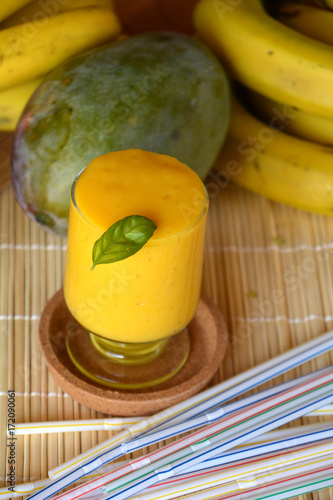 Fototapeta Naklejka Na Ścianę i Meble -  Mango smoothie healthy fresh organic drink on a glass.     