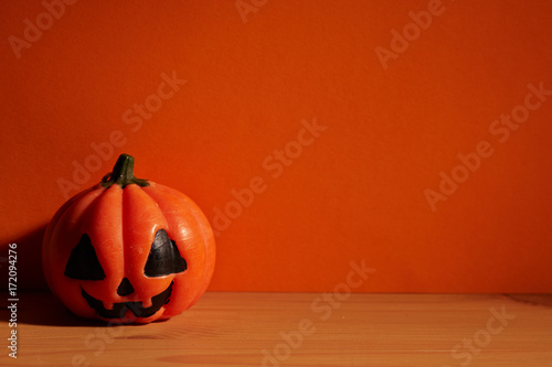 halloween holiday concept pumpkin on wooden table photo