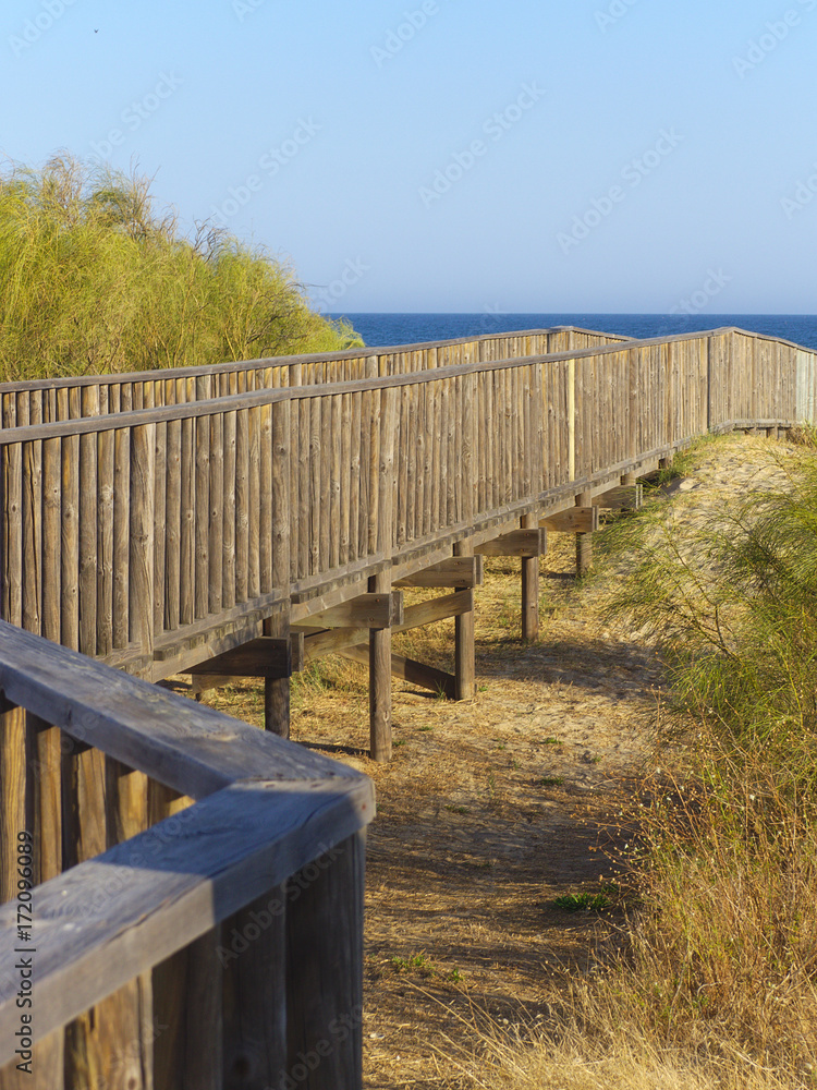 Wooden walkway to access beach