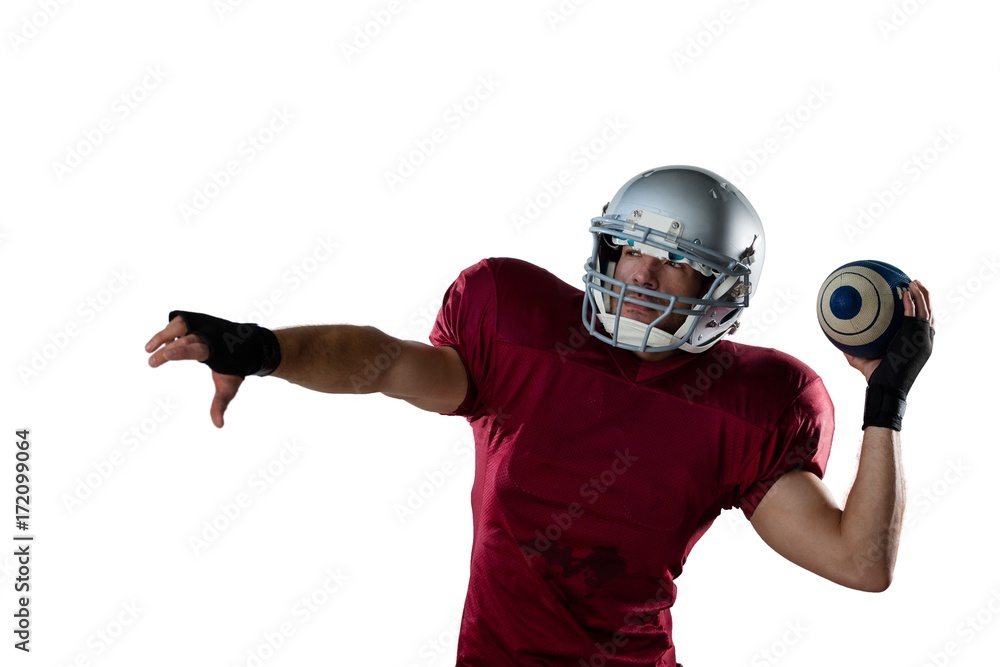 American football player wearing helmet throwing ball American football player wearing helmet throwing ball