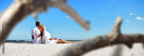 Photography autumn time and two lovers on beach