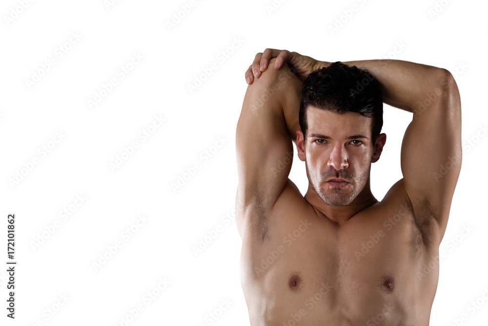 Fototapeta premium Portrait of determind shirtless sports player stretching hands