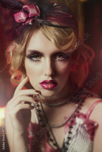 Fototapeta Naklejka Na Ścianę i Meble -  Retro portrait of a beautiful Gatsby woman. Vogue fashion style and smoke