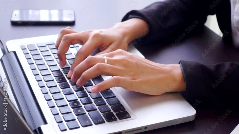 Young business woman using laptop. Young business woman using laptop.