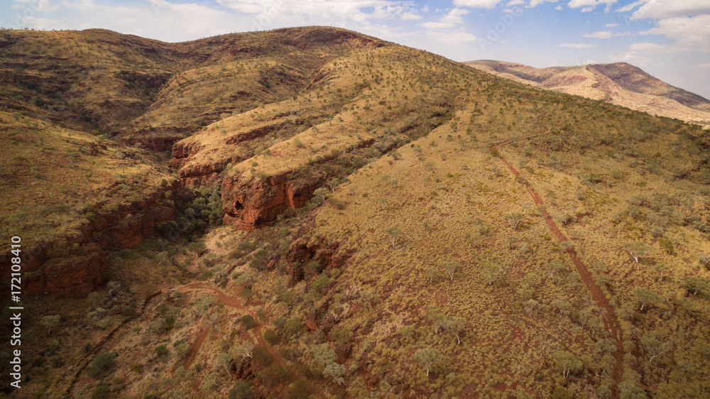 Aerial view at Dawn of Mountainous Landscape in the Karijini National Park, Pilbara Australia