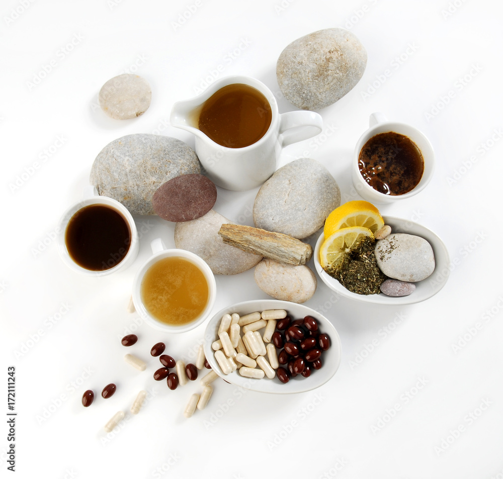 Diet pills with arrangement of coffee and tea cups Diet pills with arrangement of coffee and tea cups