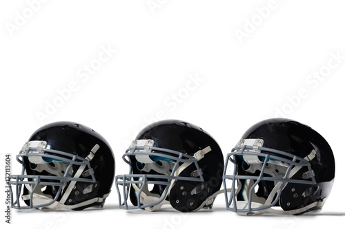 Close up of black sports helmets arranged side by side