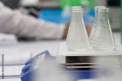 Canvas Print Experiment chemical solution mixing liquids on a Hotplate Stirrer in Lab