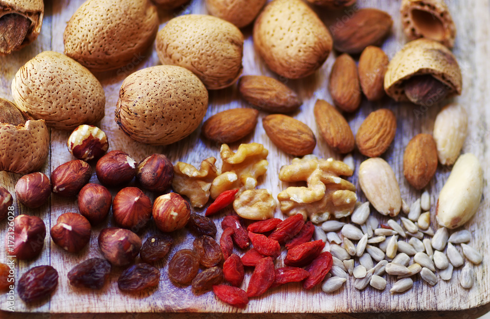 fruits and dried fruits on wooden table fruits and dried fruits on wooden table