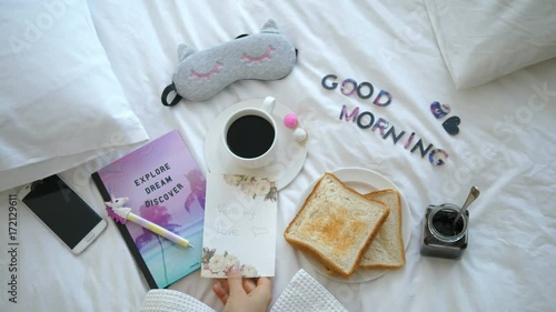 Love Note with Cup of Coffee And Toasts In Bed. Lovelt Hipster Breakfast. 4K.  photo