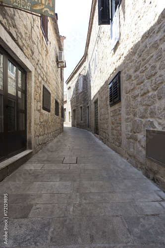 Narrow empty street of medieval town © Eswaran