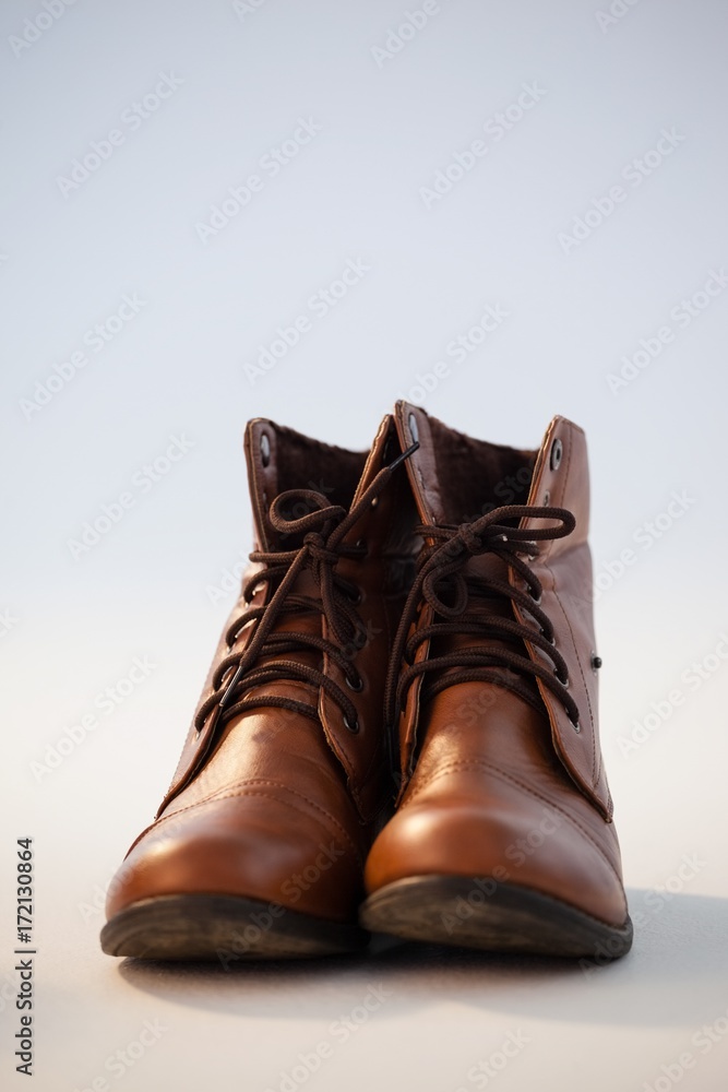 Pair of shoes against white background