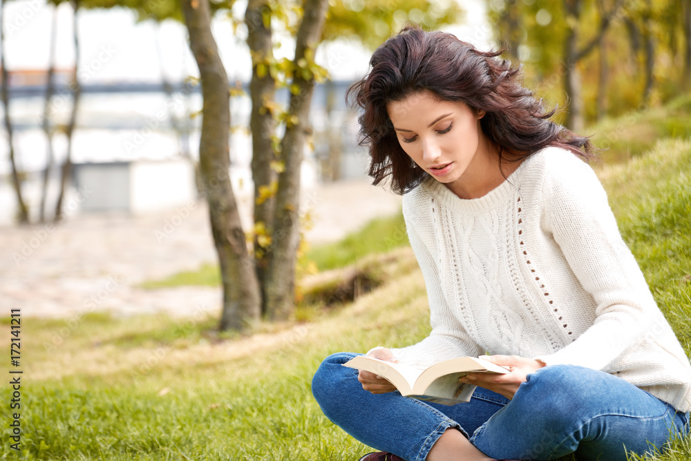 lovely beautiful woman in a woolen sweater relaxes. lovely beautiful woman in a woolen sweater relaxes.