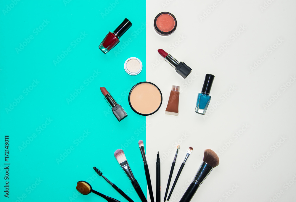Set cosmetics makeup, brush, eye shadow and lipstick, colourful background. Lifestyle Concept Set cosmetics makeup, brush, eye shadow and lipstick, colourful background. Lifestyle Concept