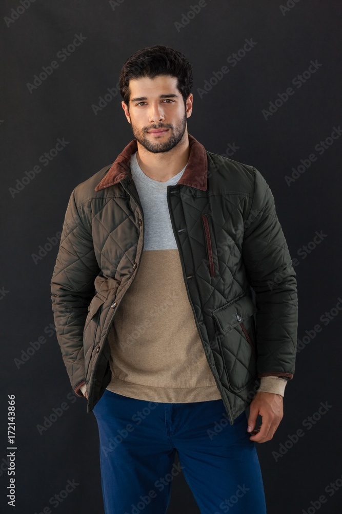Man posing against black background Man posing against black background
