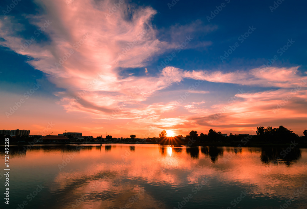 Beautiful colorful sky at sunset on the lake. Sky at sunset over the lake,Thailand.