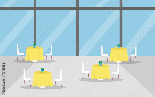 Interior restaurant or cafe in the airport on the background of a large glass window with tables, chairs, yellow tablecloth and bouquets of flowers