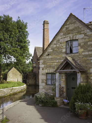 Stone House by Creek