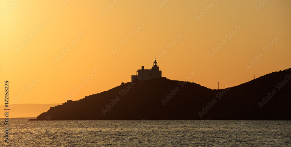 Greece, Seascape with lighthouse on Kea island at sunset