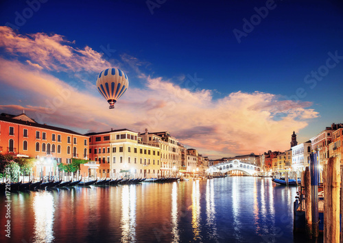 City landscape. Rialto Bridge Ponte Di Rialto in Venice  Italy at night. Many tourists visiting the beauty of the city throughout the year