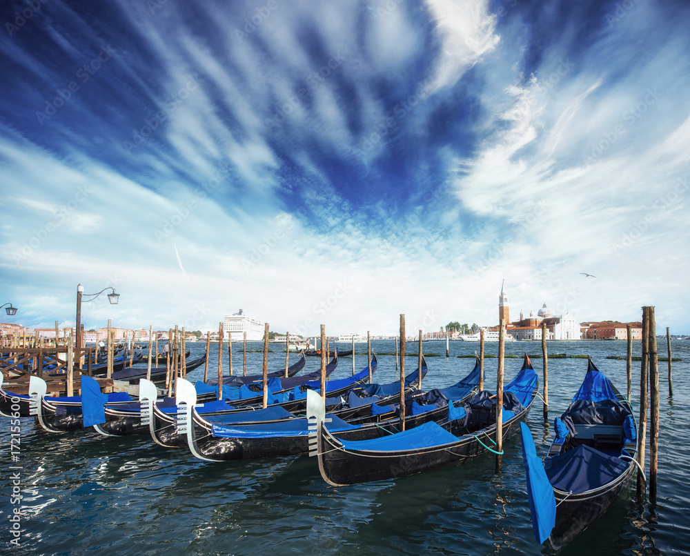 Gondolas on Grand canal in Venice, San Giorgio Maggiore church. San Marco. Beautiful summer landscape.