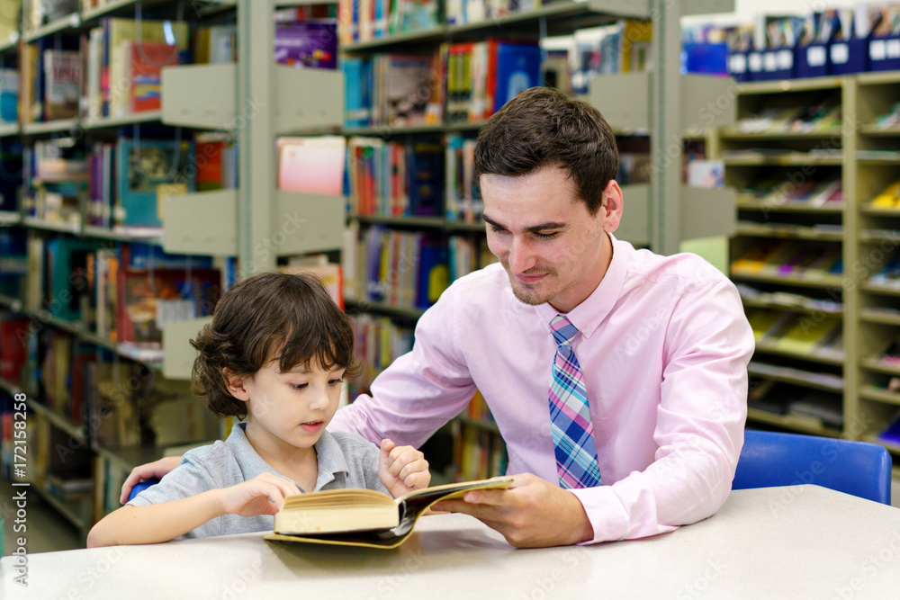 Childern studying in a library Childern studying in a library