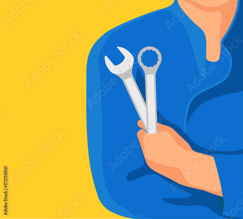 Hand of car mechanic with wrench. Auto repair garage.